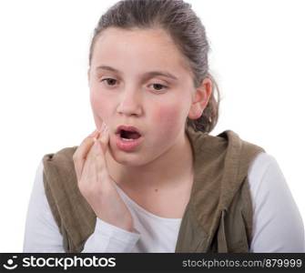 teenager has a toothache isolated on white background