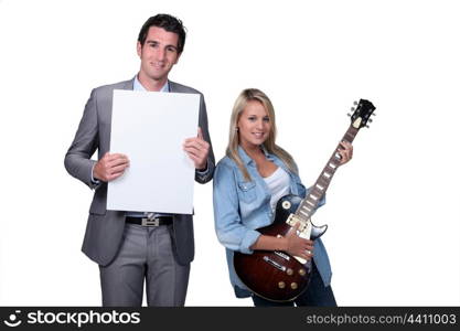 Teenager having a guitar lesson