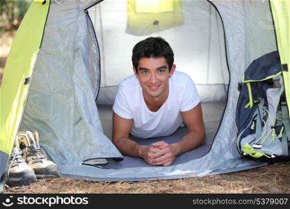 Teenager in a tent