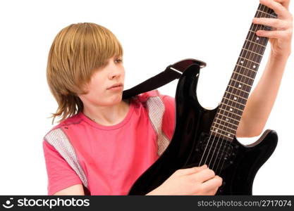 teenager musician plays on guitar