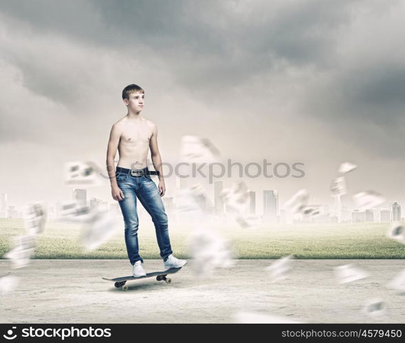 Teenager on skateboard. Skater in jeans riding on road against city background