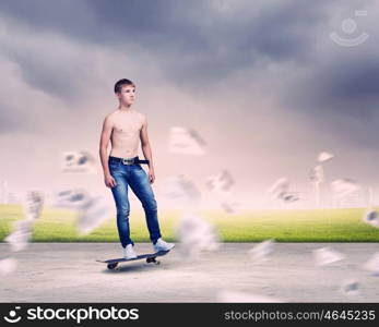 Teenager on skateboard. Skater in jeans riding on road against city background