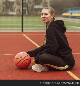 teenager posing basketball field 3