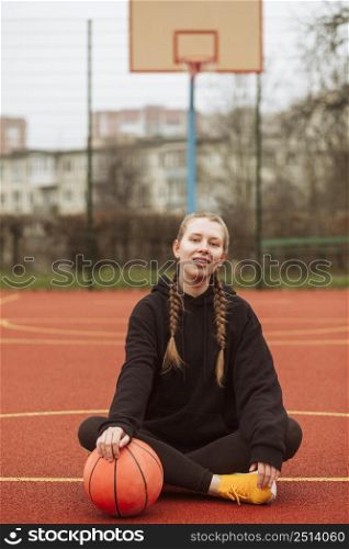 teenager posing basketball field 5