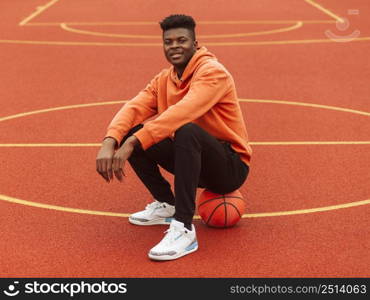 teenager posing basketball field 8