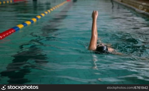 teenager practicing in a swimming pool