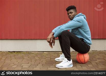 teenager with basketball ball 4