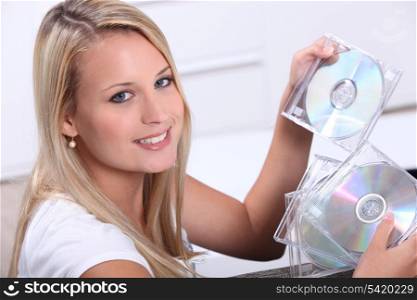 teenager with CDs