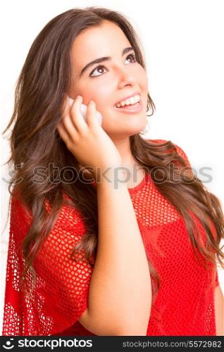 Teenager with cellphone, posing over a white background