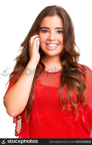 Teenager with cellphone, posing over a white background