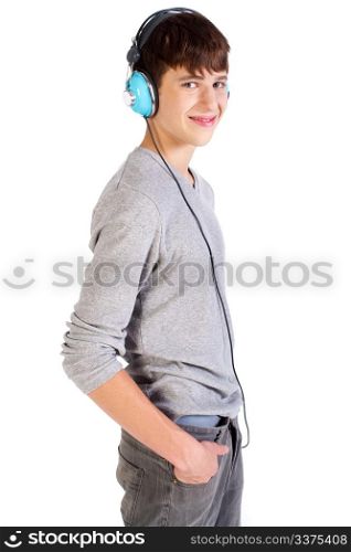 Teenager with headphones isolated over a white background.