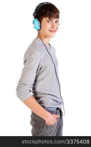 Teenager with headphones isolated over a white background.