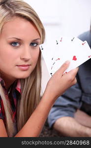 teenager with playing cards