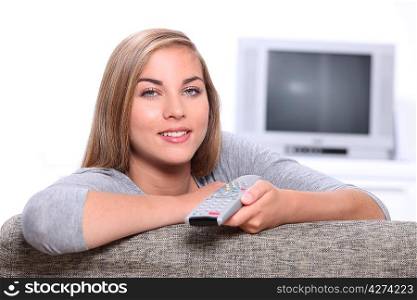 Teenager with remote control