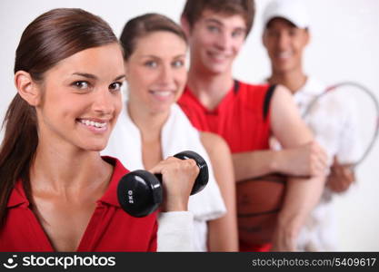 Teenagers dressed for sports