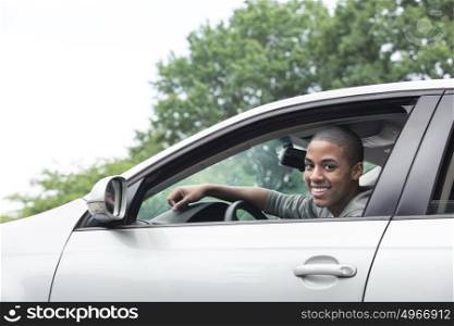 Teenagers driving car