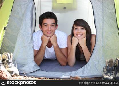 Teenagers in a tent