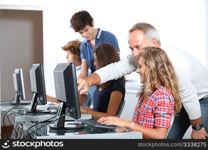 Teenagers in computing class