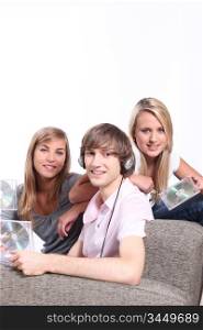 Teenagers listening to CDs