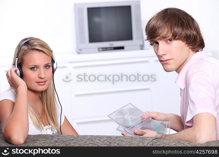 Teenagers listening to music