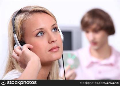 Teenagers listening to music