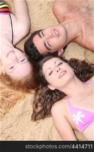 Teenagers on the sand