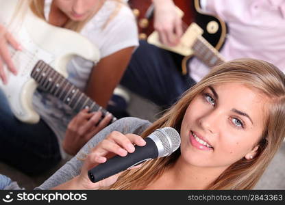 Teenagers playing instruments