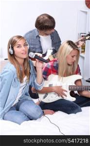 teenagers playing music instruments