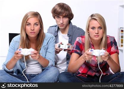 teenagers playing video games