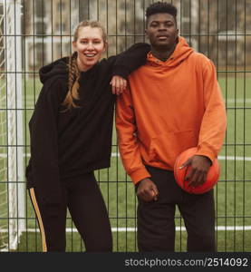 teenagers posing basketball field 5