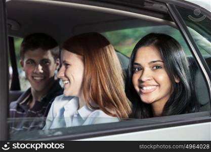 Teenagers riding in car
