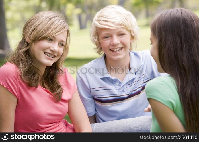 Teenagers Sitting And Conversing