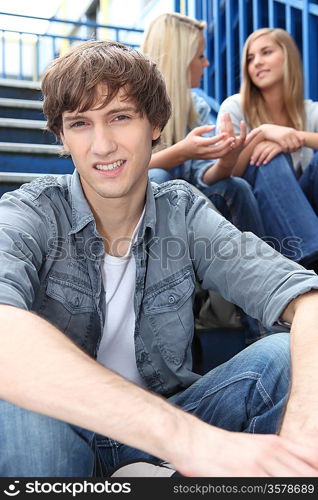 Teenagers sitting on the steps