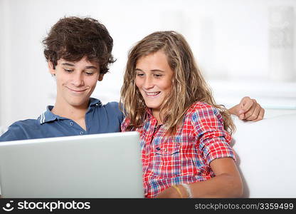 Teenagers surfin on internet at home