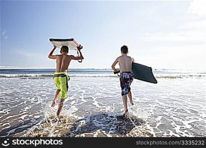 Teenagers surfing