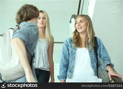 teenagers talking in stairs