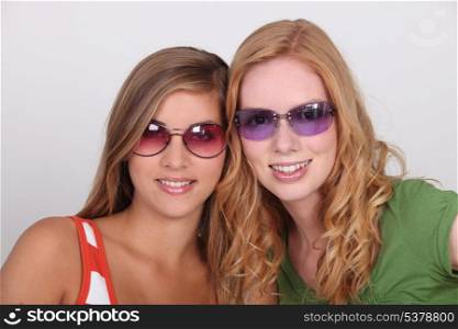 Teenagers wearing sunglasses
