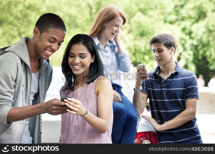 Teenagers with car