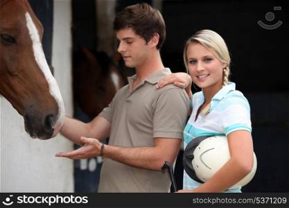 Teens in riding stables