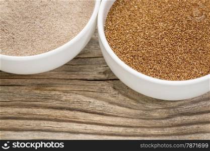 teff grain and flour in small ceramic bowls against grained wood background