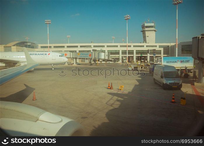 Tel Aviv, Israel - July 28, 2014: Air France airline commercial plane parking and cargo tracks near terminal 3 at Ben Gurion international airport.