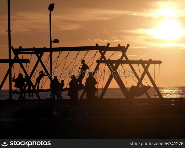 Tel Aviv-swing on the beach. Tel Aviv - swing on the beach in the evening twilight