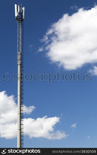 Telecom tower in sunny summer day. GSM telecom tower in sunny summer day