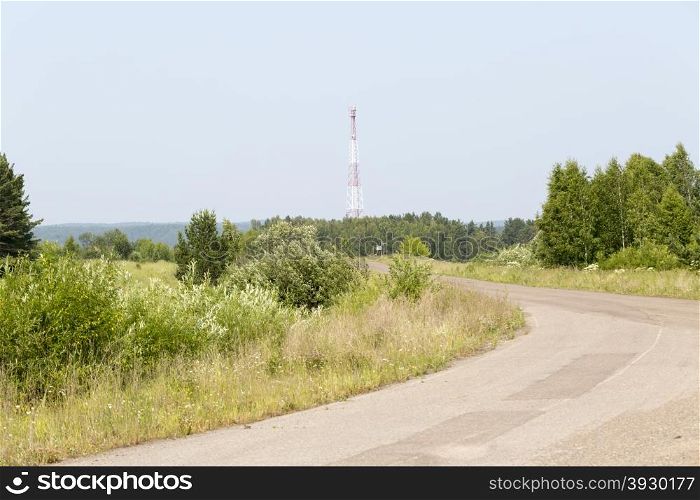 Telecommunication cell tower. Telecommunication tower and radio cell antenna outside of town