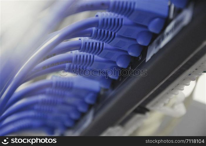 Telecommunication Ethernet Cables Connected to Internet Switch, Data Center Concept.