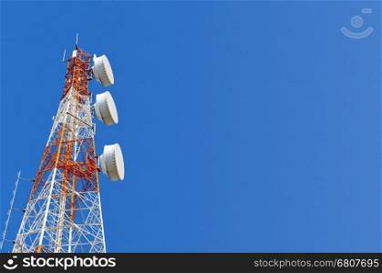 Telecommunication tower on blue sky blank background. Used to transmit television and telephony signal