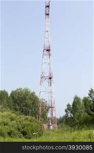 Telecommunication tower outside of town. Modern telecommunication cell tower. Outside of town