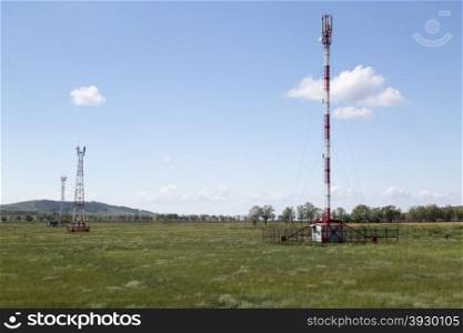 Telecommunication towers in sunny summer day. Telecommunication lte and gsm towers in sunny summer day