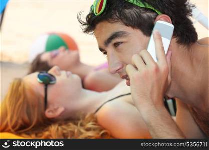 Telephoning from the beach