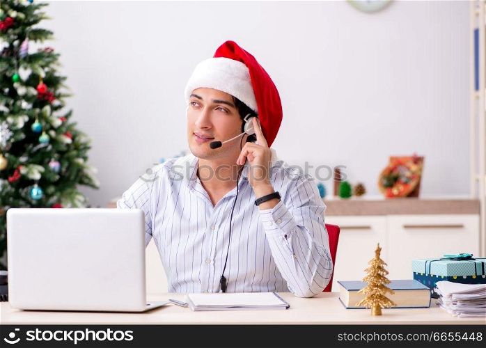 Telesales operator during christmas sale on the phone